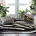 Black/White 60 x 1.38 in Indoor Area Rug - Ebern Designs Temme Hand-Tufted Black & White Area Rug Polyester | 60 W x 1.38 D in | Wayfair