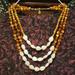 Anthropologie Jewelry | Anthropologie Triple Strand Beaded Necklace | Color: Brown/White | Size: Os