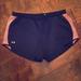 Under Armour Shorts | Black And Pink Under Armour Women’s Large Shorts | Color: Black/Pink | Size: L