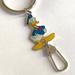 Disney Accessories | Disney Donald Duck Keychain Zipperpull Purse Charm | Color: Blue/Yellow | Size: Os