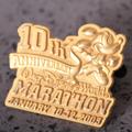 Disney Other | A Gold Tone 10th Anniversary Disney Marathon Pin | Color: Gold | Size: Os