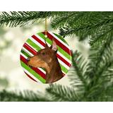 The Holiday Aisle® Doberman Holiday Christmas Hanging Figurine Ornament Ceramic/Porcelain in Brown/Green/Red | 3 H x 3 W x 0.25 D in | Wayfair