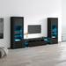 Orren Ellis Earle Entertainment Center for TVs up to 88" Wood/Glass in Black | Wayfair 564148AE3228408EB24AD50FDDD6BD1D