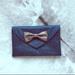 Anthropologie Bags | Anthropologie Shimmer Bow Clutch | Color: Blue/Pink | Size: Os