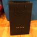 Gucci Bags | Authentic Gucci Paper Shopping Bag Brand New | Color: Black/White | Size: Os