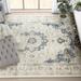 Blue 144 x 0.37 in Area Rug - Langley Street® Annette Oriental Ivory/Area Rug, Polypropylene | 144 W x 0.37 D in | Wayfair