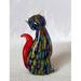 Ebern Designs Otego Glasss Cat Figurine Glass in Blue/Green/Red | 6.25 H x 3 W x 3 D in | Wayfair 6AEECD8082BF44C9869CC320A724BE11
