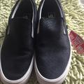 Vans Shoes | Black Leather Slip On Vans 1/2 Size Different | Color: Black | Size: 8.5