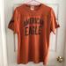 American Eagle Outfitters Shirts | American Eagle Vintage Slim Fit T-Shirt | Color: Black/Orange | Size: L