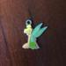 Disney Jewelry | Authentic Disney Tinkerbell Charm | Color: Green/Yellow | Size: Os