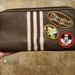 Disney Bags | Disneyland Resort Brown Zip Around Wallet | Color: Brown/Pink | Size: 8 X 4