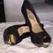 Jessica Simpson Shoes | Jessica Simpson Black And Gold Peep Toe Heels | Color: Black/Gold | Size: 7