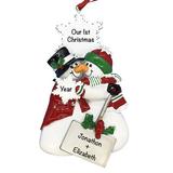 The Holiday Aisle® Gingerbread Heart Couple 1st Christmas Hanging Figurine Ornament Plastic in Red/White | 5 H x 2.75 W x 0.5 D in | Wayfair