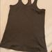Under Armour Tops | Grey Racer Back Tank Top. Under Armour | Color: Gray | Size: Xl