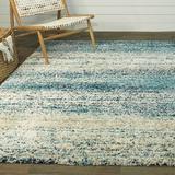 Blue/Green 63 x 1.18 in Area Rug - Sand & Stable™ Loudres Teal Area Rug | 63 W x 1.18 D in | Wayfair 4A0A3702C9FD4B5CB69370799F02F291