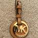 Michael Kors Accessories | Michael Kors Tan Gold Purse Hook Accessory New | Color: Gold/Tan | Size: Os