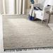 SAFAVIEH Vintage Leather Zharko Solid Braided Fringe Area Rug Silver 6 x 9