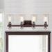 Breakwater Bay Dousman 4 - Light Oil Rubbed Bronze Vanity Light in Brown | 10.5 H x 29.25 W x 6.5 D in | Wayfair BC5DC924F00443E19A547B88E012E823