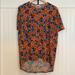 Lularoe Tops | Lularoe Disney Irma Shirt | Color: Blue/Orange | Size: Xxs