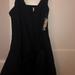 Free People Dresses | Free People Black Never Worn Mini Wrap Dress | Color: Black | Size: 0