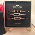 Coach Jewelry | Coach 3 Piece Signature Kissing C Bangle Set | Color: Gold/Silver | Size: 2.5” Diameter