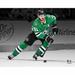 Tyler Seguin Dallas Stars Unsigned Green Jersey Skating Spotlight Photograph