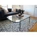 17 Stories Coffee Table Glass/Metal in Black | 13.5 H x 31.7 W x 47 D in | Wayfair 52583CD98D7A4909B357C29327B3A09F