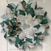 The Holiday Aisle® Christmas Wreath w/ Poinsettia & Peacock Ribbons Burlap/Deco Mesh in Blue/Green/White | 24 H x 24 W x 6 D in | Wayfair