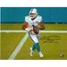 Tua Tagovailoa Miami Dolphins Autographed 8" x 10" White Jersey Rolling Out Photograph