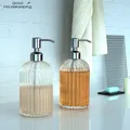 Bouteille de désinfectant pour les mains en verre transparent grand distributeur manuel Regina