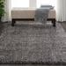 Gray 60 x 2 in Indoor Area Rug - Ebern Designs Ferdy Modern Solid Shag Charcoal Area Rug Polyester | 60 W x 2 D in | Wayfair