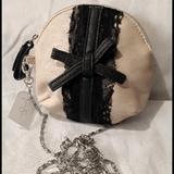 Jessica Simpson Bags | Jessica Simpson Beige Black Bow Mini Shoulder Bag | Color: Black/Cream | Size: 6 X 6 X 1"