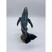 Rosecliff Heights Keynsham Whale on Wave Resin in Black/Gray | 7.5 H x 7 W x 4.5 D in | Wayfair FE40A2AD53CA4B74B259182B8A88282B