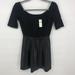 Anthropologie Dresses | Faux Leather Skater Mini Dress Black Petite Xs | Color: Black | Size: Xsp