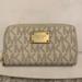 Michael Kors Other | Cream/ Beige Michael Kors Wallet | Color: Cream/Tan | Size: Os