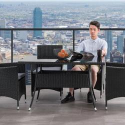Red Barrel Studio® Loizzo Dining Table Glass/Wicker/Rattan in Black | 29 H x 47 W x 31 D in | Outdoor Furniture | Wayfair