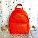 Michael Kors Bags | Michael Kors Small Leather Backpack In Tangerine | Color: Orange | Size: 9 X 9 X 3 Inches