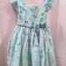Disney Dresses | Disney Tsum Tsum Chiffon Girl Green Dress Sz 3t | Color: Green | Size: 3tg
