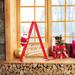 Mr. Christmas 17" Animated Tabletop Climbing Black Santa Plastic in Red | 17 H x 15.5 W x 3.5 D in | Wayfair 37278