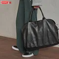 Sac à main en cuir de vache souple pour femmes sac de voyage noir à grande capacité pour ordinateur