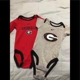 Nike One Pieces | 2 Nike Baby Georgia Onesies Size 3-6 Months | Color: Gray/Red | Size: 3-6mb