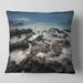 Designart 'Rocky Seashore with Blue Sky Over' Seashore Throw Pillow