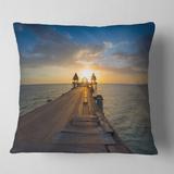 Designart 'Huge Wooden Pier into Setting Sun' Pier Seascape Throw Pillow