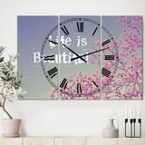 Designart 'Life Is Beautiful' Oversized Cottage Wall Clock - 3 Panels - 36 in. wide x 28 in. high - 3 Panels
