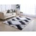 Black/White 60 x 0.98 in Area Rug - Latitude Run® Corey-Leigh Abstract Shag White/Black Area Rug Polyester | 60 W x 0.98 D in | Wayfair