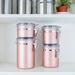 Rebrilliant Creative Home Set of 4 Stainless Steel Storage Canister w/ Clear Airtight Lid Locking Clamp Metal in Pink | 7 H x 5 W x 5 D in | Wayfair