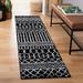 Black/White 24 x 0.39 in Indoor Area Rug - Foundry Select Cobos Geometric Black/Ivory Area Rug | 24 W x 0.39 D in | Wayfair