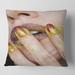 Designart 'Close-Up Of Golden Gold Glitter Lipstick' Modern Printed Throw Pillow
