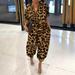 Tomshoo Women Plus Size Jumpsuit Solid Leopard Printed Pockets Buttons Front Belted Waist Casual Loose Rompers S-5XL