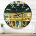 East Urban Home Facade of Houses In Street In Paris - French Country wall clock Metal in Yellow | 23 H x 23 W x 1 D in | Wayfair